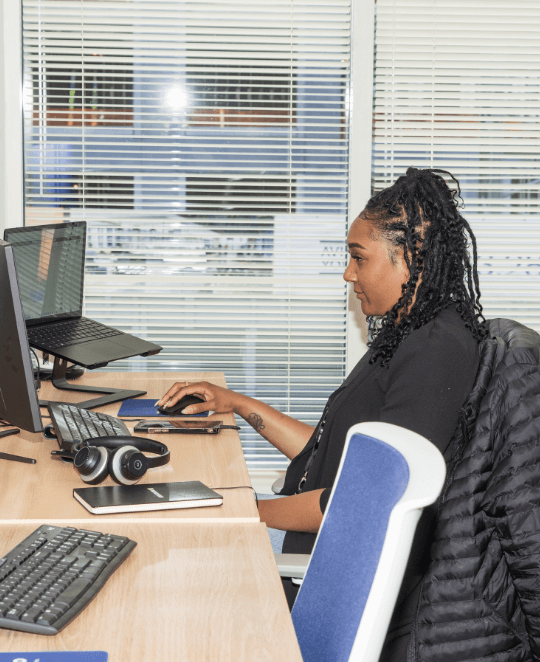 Employee working at her desk